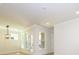 Bright living room with an eye-catching lighting fixture and ample natural light at 17021 Malone Ln, Mint Hill, NC 28227