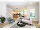 Open concept living room flows into kitchen; features modern decor and natural light at 17021 Malone Ln, Mint Hill, NC 28227