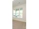 Bright living room with large windows providing an abundance of natural light at 17021 Malone Ln, Mint Hill, NC 28227