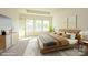 Spacious main bedroom features neutral color palette, plush carpet, and bright natural light at 17021 Malone Ln, Mint Hill, NC 28227