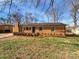 Attractive brick single-story home with manicured landscaping and inviting curb appeal at 207 Bright Ave, Bessemer City, NC 28016