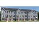 New gray townhomes showcase black shutters and red doors at 2159 Primm Farms Dr # C, Charlotte, NC 28216