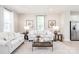 Inviting living room area featuring neutral tones and lots of natural light at 2159 Primm Farms Dr # C, Charlotte, NC 28216