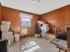 Bedroom featuring paneled walls, a window, and furnishings at 3204 Starrland Dr, Gastonia, NC 28052