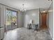 Bright dining area featuring a sliding glass door to the deck and gray walls at 3204 Starrland Dr, Gastonia, NC 28052