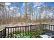 Balcony with a view of the snowy woods on a cloudy day at 3308 Timber Mill Dr, Stallings, NC 28104