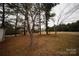 Rear of property showing treed yard at 351 York Spann Rd, Hamptonville, NC 27020