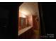 Bathroom featuring a well-lit vanity, sink, and a bathtub with shower fixtures at 351 York Spann Rd, Hamptonville, NC 27020