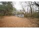 Quaint single-story home nestled among trees, offering a serene and private setting at 351 York Spann Rd, Hamptonville, NC 27020