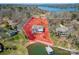 Aerial view showing the property line and brick home with a private dock and lush landscaping at 4164 54Th Ne Ave, Hickory, NC 28601