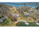 Expansive lakefront property featuring a charming home with a private dock and beautiful waterfront views at 4164 54Th Ne Ave, Hickory, NC 28601