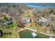 Lakeside home featuring a private dock and mature trees surrounding the property at 4164 54Th Ne Ave, Hickory, NC 28601