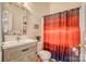 Bathroom featuring a vanity with framed mirror, a toilet, and a shower with a colorful curtain at 4164 54Th Ne Ave, Hickory, NC 28601
