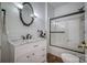 Classic bathroom features a white vanity with marble countertop and bronze fixtures at 4164 54Th Ne Ave, Hickory, NC 28601