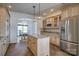 Open kitchen with island, granite countertops, stainless steel appliances, and view to breakfast area at 4164 54Th Ne Ave, Hickory, NC 28601