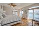 Main bedroom with hardwood floors, water view, and a large window for natural light at 4164 54Th Ne Ave, Hickory, NC 28601