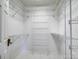 Walk-in closet with metal shelving, ample storage space, and light hardwood flooring at 4164 54Th Ne Ave, Hickory, NC 28601