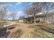 Spacious backyard with a screened-in porch and ample space for gardening or outdoor activities at 706 Skinner Rd, Shelby, NC 28152