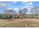 Expansive backyard featuring a shed, mature trees, and plenty of space for outdoor activities and recreation at 706 Skinner Rd, Shelby, NC 28152