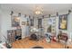 Spacious bedroom decorated with musical themes, a fan, and wood-look flooring at 706 Skinner Rd, Shelby, NC 28152