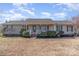 Charming single-story home features a covered front porch and manicured landscaping at 706 Skinner Rd, Shelby, NC 28152