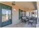 Inviting front porch with cozy seating area and ceiling fan at 706 Skinner Rd, Shelby, NC 28152
