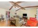 Open living room with beamed ceilings, hardwood floors and comfortable seating at 706 Skinner Rd, Shelby, NC 28152
