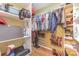Well-organized walk-in closet with shelves, hanging rods, and space for shoes and storage at 706 Skinner Rd, Shelby, NC 28152