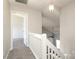 Upstairs hallway that leads to the bedrooms at 7725 Petrea Ln, Charlotte, NC 28227