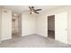 Bright main bedroom with carpet and an ensuite bathroom at 7725 Petrea Ln, Charlotte, NC 28227