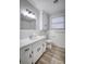 Bathroom featuring a large vanity and tiled walls at 924 S Main Ave, Newton, NC 28658