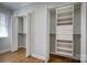 Walk-in closet includes custom shelving and organization system at 924 S Main Ave, Newton, NC 28658