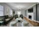 Cozy living room featuring stylish furniture, a fireplace, and an elegant chandelier at 924 S Main Ave, Newton, NC 28658