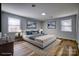 Cozy main bedroom featuring a comfortable bed, elegant decor, and abundant natural light at 924 S Main Ave, Newton, NC 28658