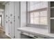 Bright office area features built in storage and desk space next to a window at 924 S Main Ave, Newton, NC 28658