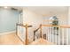 Bright foyer features natural light through the glass and wood trim, accenting the open staircase at 10230 Blackstock Rd, Huntersville, NC 28078