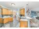 Eat-in kitchen boasts stylish bar seating and plentiful counter space at 10230 Blackstock Rd, Huntersville, NC 28078