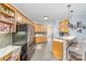 Eat-in kitchen boasts stylish bar seating and stainless appliances at 10230 Blackstock Rd, Huntersville, NC 28078