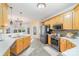 Open concept kitchen features stainless steel appliances and tile flooring at 10230 Blackstock Rd, Huntersville, NC 28078