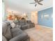 Spacious living room offers ample seating and seamless transition to kitchen at 10230 Blackstock Rd, Huntersville, NC 28078