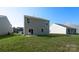 View of the back of the house featuring a green lawn and vinyl siding at 1109 Foxberry Ln, Maiden, NC 28650