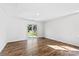 Bright room with hardwood floors and sliding doors opening to the backyard at 1109 Foxberry Ln, Maiden, NC 28650