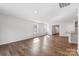 Bright living room with hardwood floors and large windows allowing ample natural light at 1109 Foxberry Ln, Maiden, NC 28650