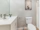 Bathroom with modern sink, faucet, mirror, and light fixture at 1111 Barrington St, Wadesboro, NC 28170