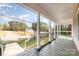 Spacious covered porch features railing and a peaceful neighborhood street view at 1111 Barrington St, Wadesboro, NC 28170