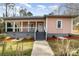 Stylish single-story home with front porch and freshly landscaped front yard at 1111 Barrington St, Wadesboro, NC 28170