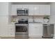 Well lit kitchen with stainless steel appliances and white subway tile backsplash at 1111 Barrington St, Wadesboro, NC 28170