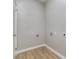 Unfinished laundry room with a neutral paint color and modern wood look flooring at 1111 Barrington St, Wadesboro, NC 28170