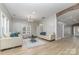 Bright living room with wood floors, neutral walls and comfortable seating at 1111 Barrington St, Wadesboro, NC 28170