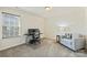 Cozy bedroom featuring a comfortable chair and a desk, perfect for a home office setup at 11206 Grenfell Ave, Huntersville, NC 28078